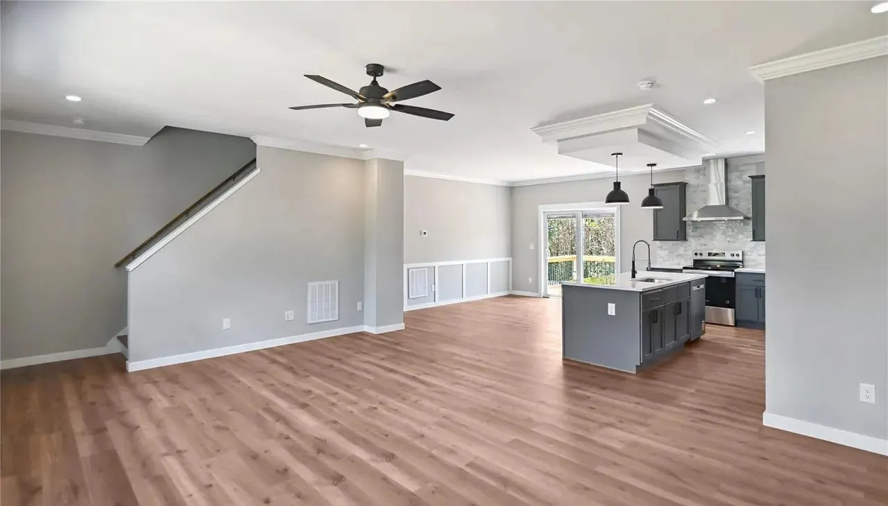 Great room with staircase in a new home built by Hart Homes